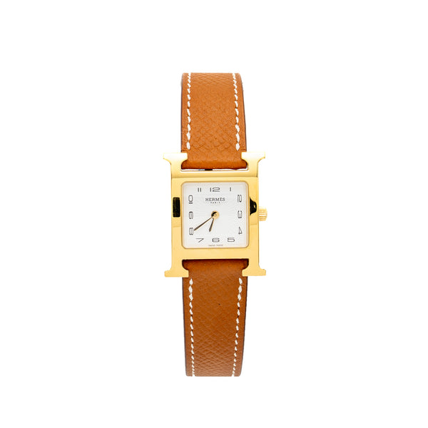 Hermes Heure H Watch, Small model 25mm yellow gold plated steel, gold strap, quartz movement