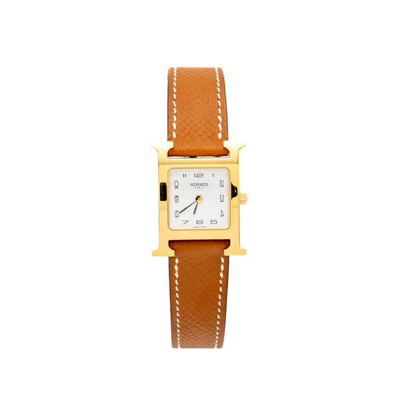 Hermes Heure H Watch, Small model 25mm yellow gold plated steel, gold strap, quartz movement