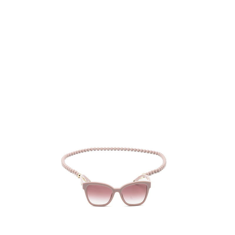 Chanel sunglasses with pearl chain pink