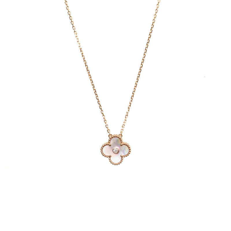 Van Cleef and Arpels and Arpels 2025 holiday pendant pink mother of pearl rose gold with diamond