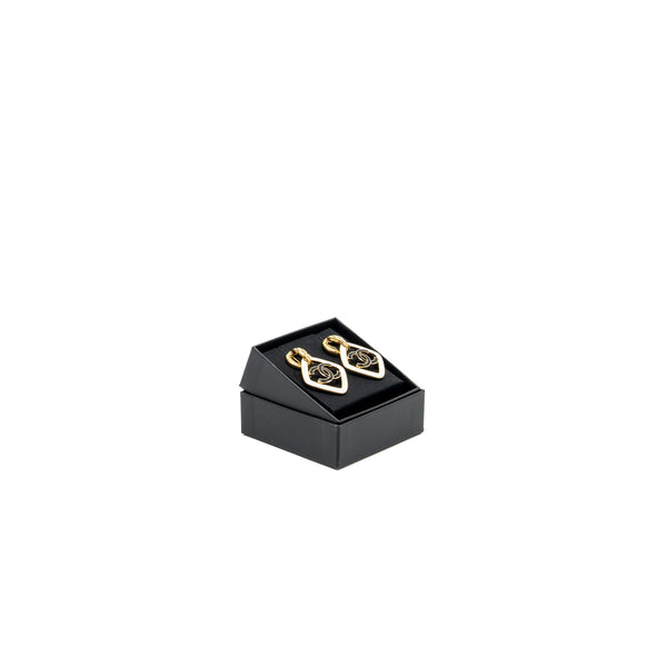 Chanel giant cc logo ear clip enamel black/white gold tone