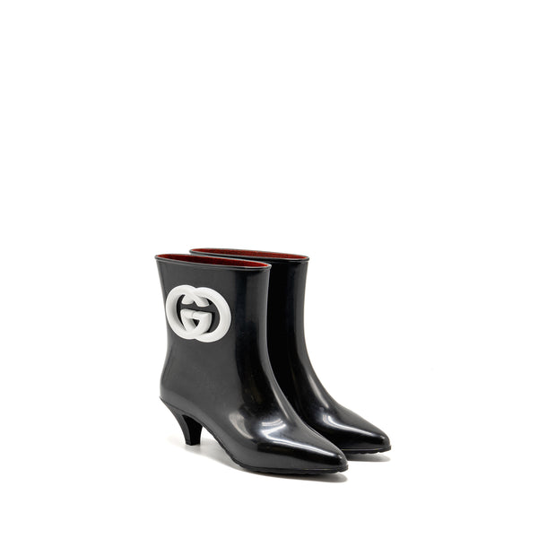 Gucci size 38 Ankel boots rubber black / white