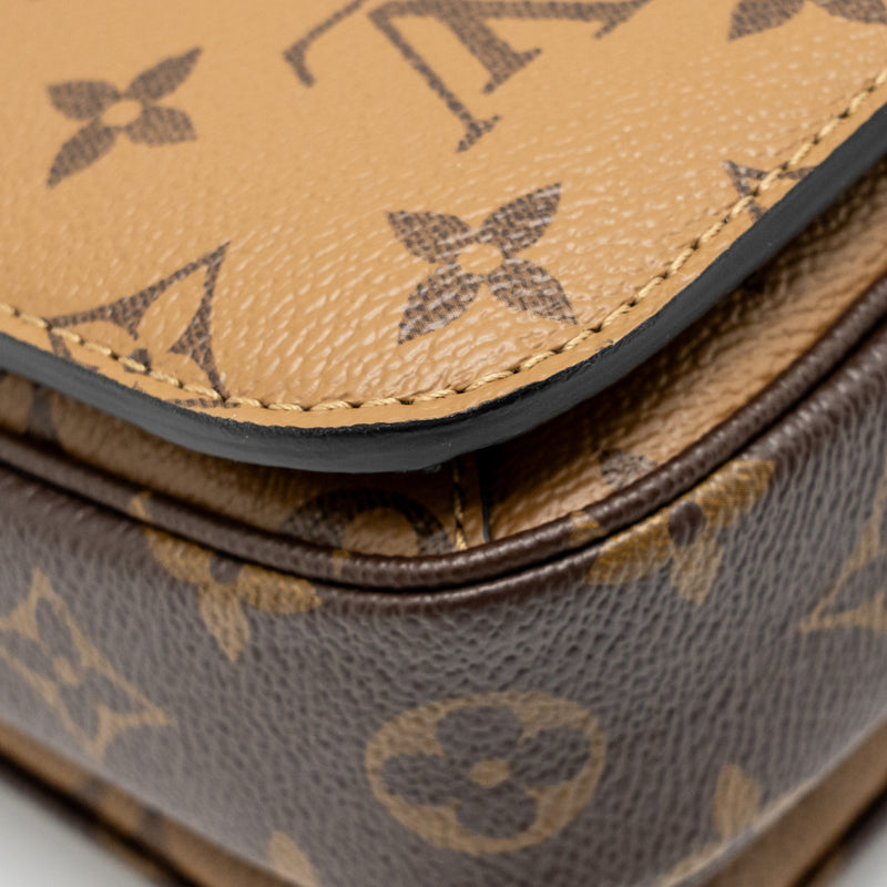 LOUIS VUITTON Pochette Métis Monogram Reverse Canvas GHW