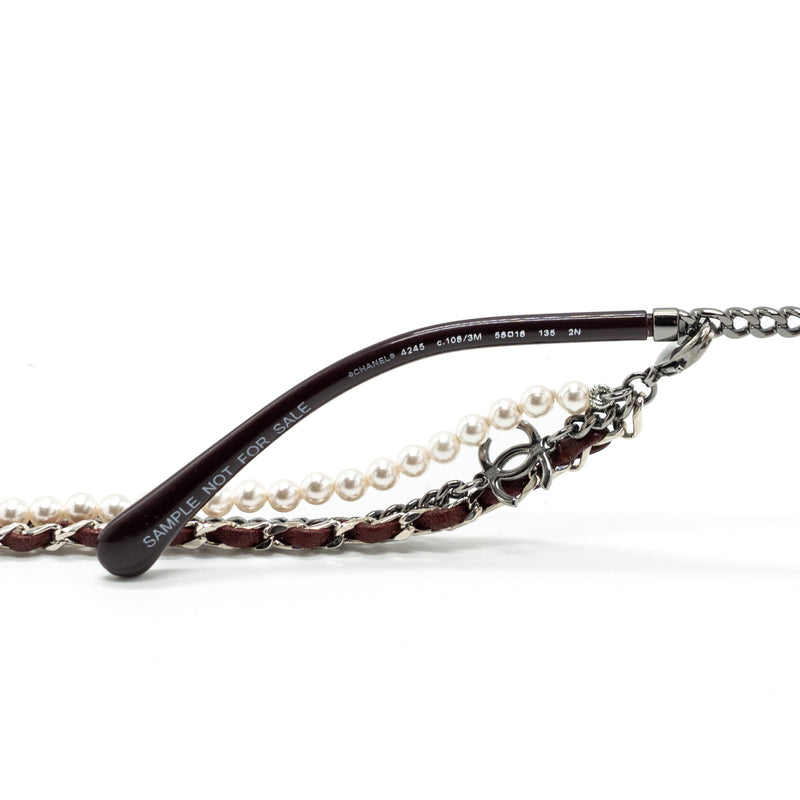 Chanel round sunglasses with chain red