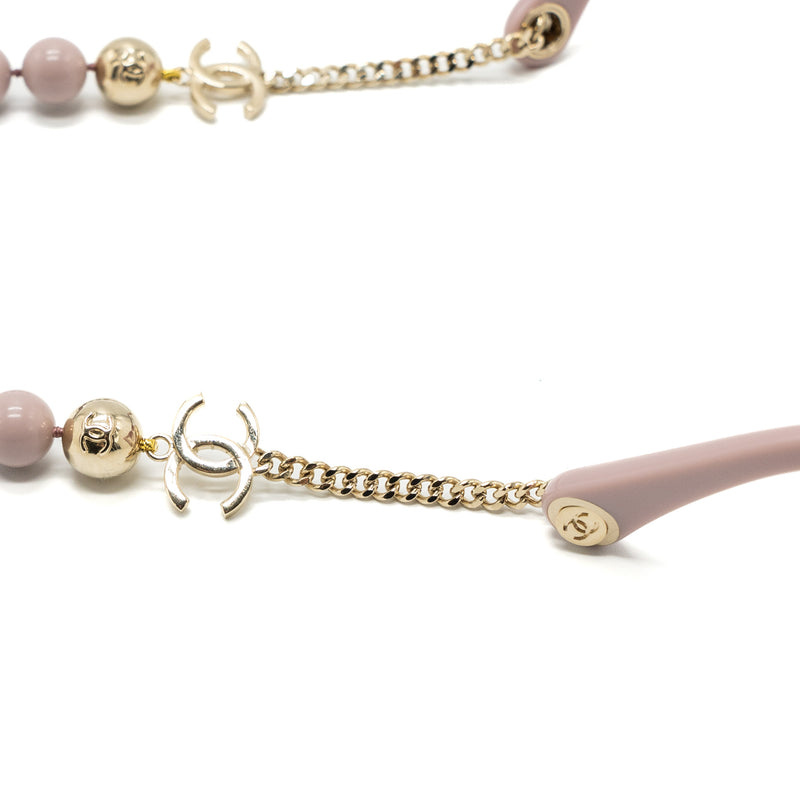 Chanel sunglasses with pearl chain pink