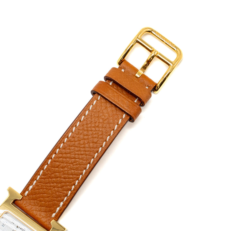 Hermes Heure H Watch, Small model 25mm yellow gold plated steel, gold strap, quartz movement