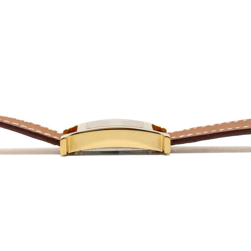 Hermes Heure H Watch, Small model 25mm yellow gold plated steel, gold strap, quartz movement