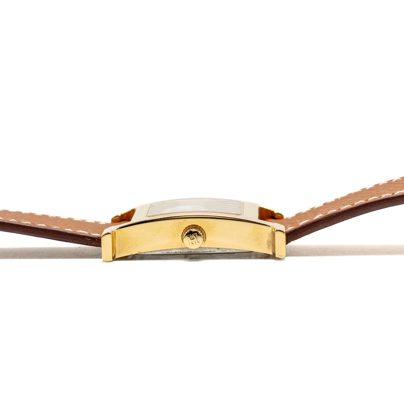 Hermes Heure H Watch, Small model 25mm yellow gold plated steel, gold strap, quartz movement