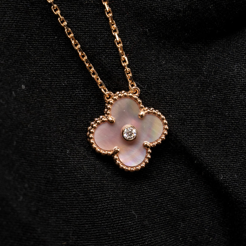 Van Cleef and Arpels and Arpels 2025 holiday pendant pink mother of pearl rose gold with diamond