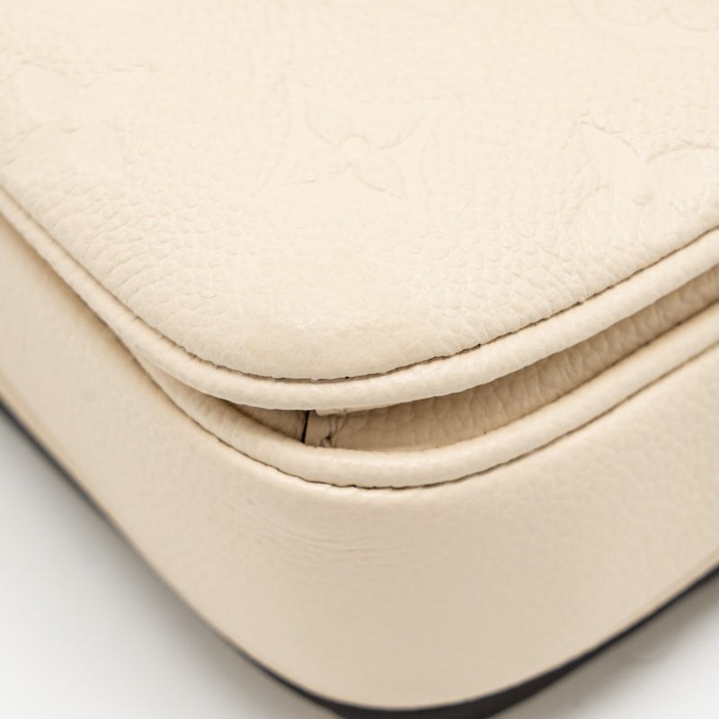 Louis Vuitton Pochette Métis East West Monogram Empreinte Leather Cream GHW