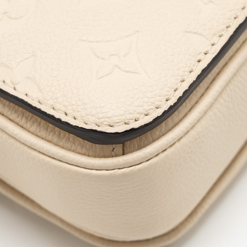 Louis Vuitton Pochette Métis East West Monogram Empreinte Leather Cream GHW