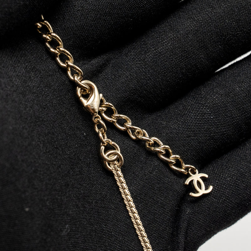 Chanel CC logo 14 motif necklace light gold tone