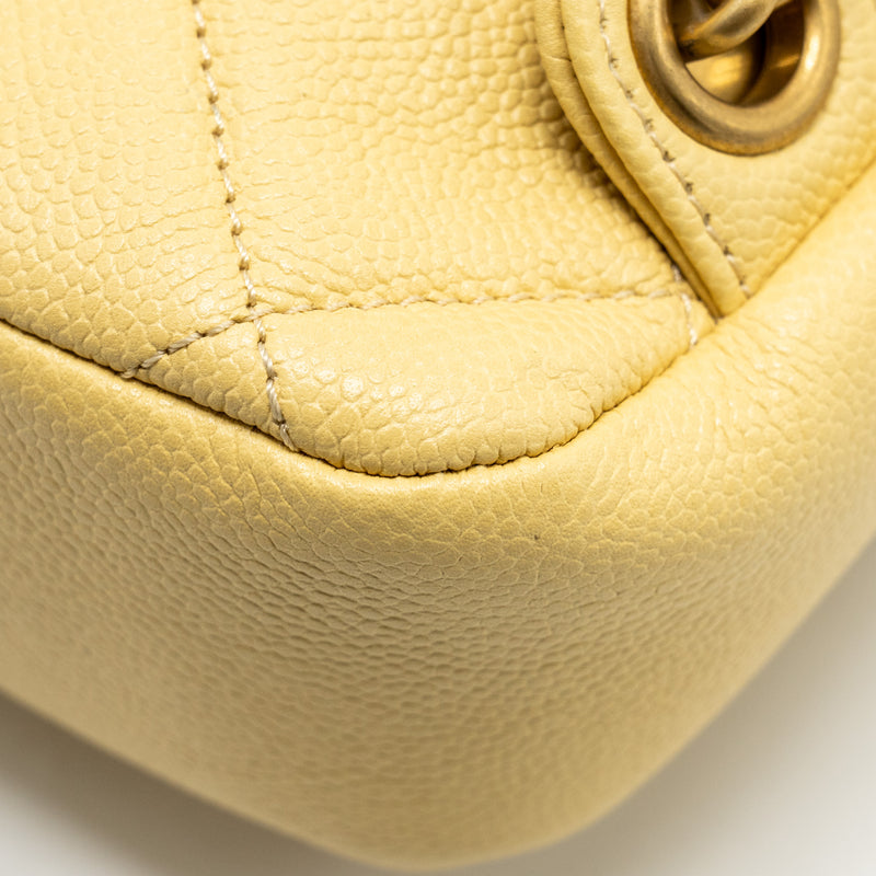 Chanel 22P quilted flap backpack caviar light yellow GHW (Microchip)