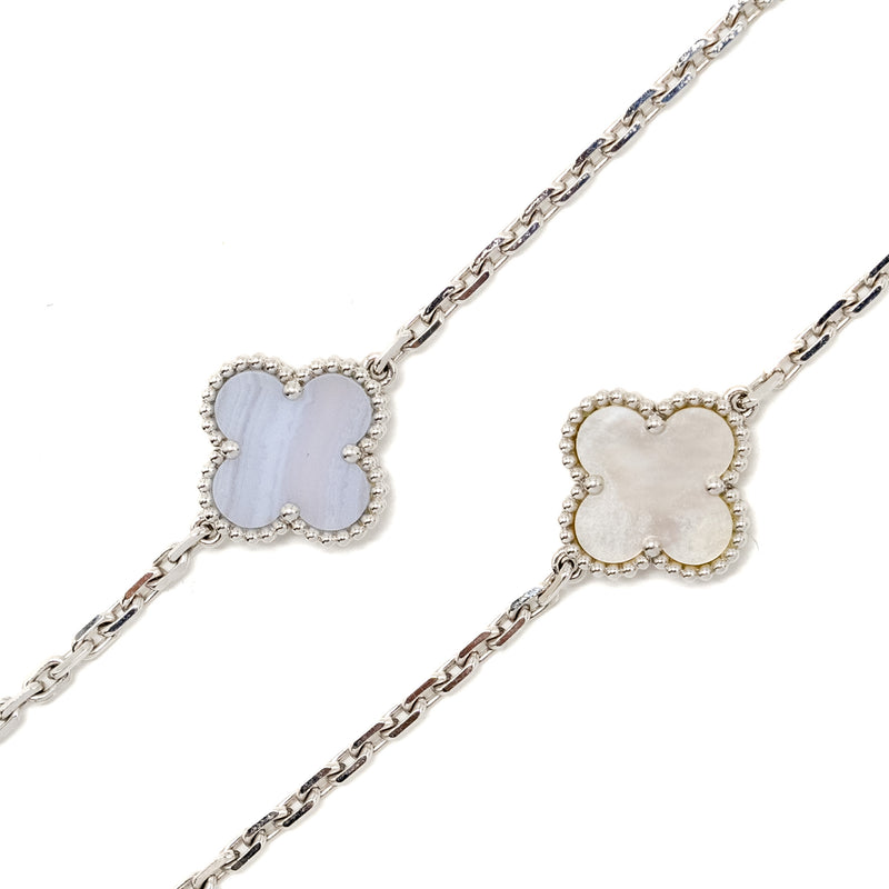 Van Cleef and Arpels magic alhambra necklace, 6 motifs WHITE GOLD/ WHITE AND GREY MOTHER OF PEARL/ CHALCEDONY