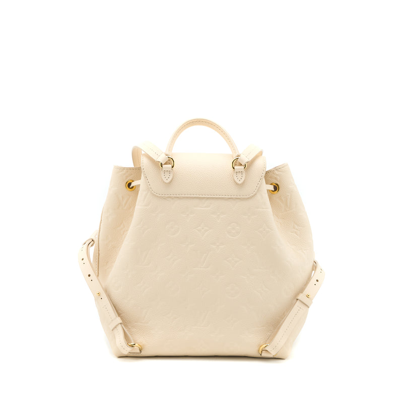 louis vuitton backpack beige Tiny in Khaki Cream and LSC INC it is embossed with a lighter version of the houses monogram Louis Vuitton Beige Calfskin Lockme