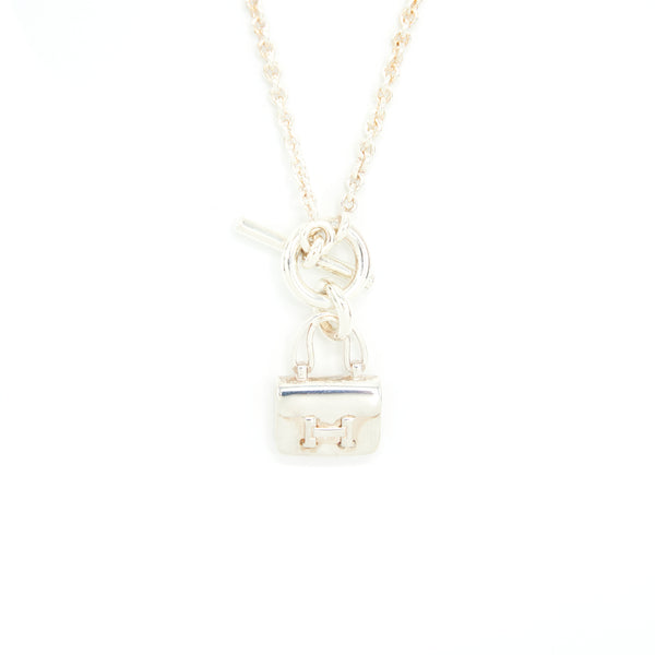 Hermes amulettes constance pendant sterling silver with toggle closure