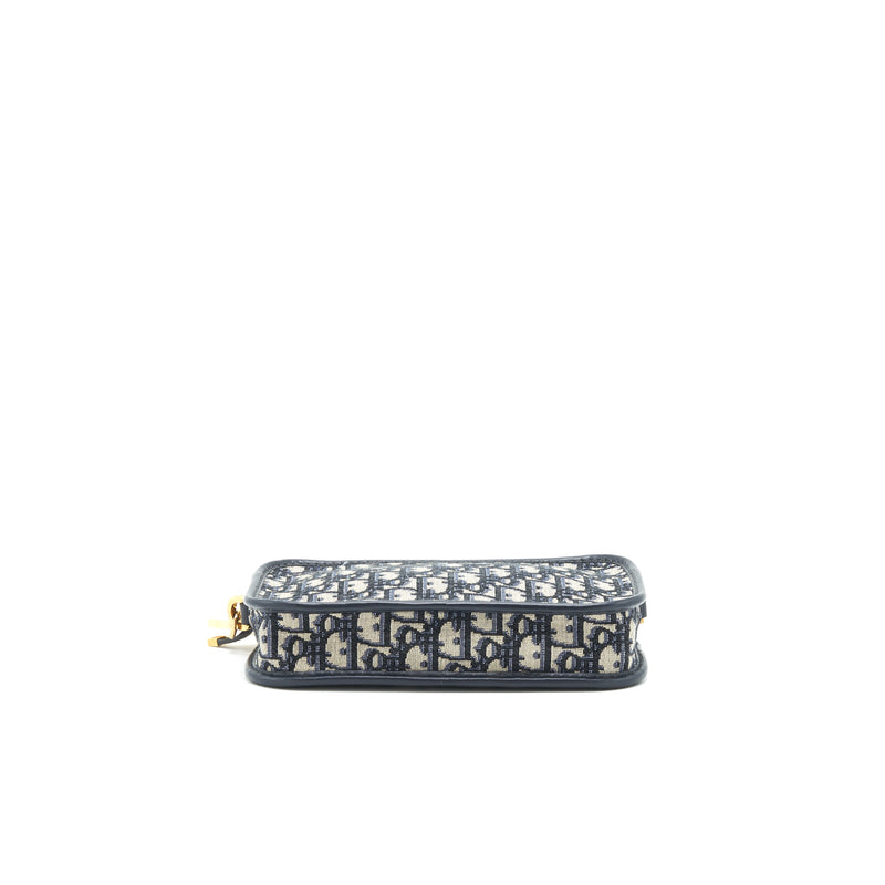 Dior Oblique diorquake clutch with extra woven logo bag strap