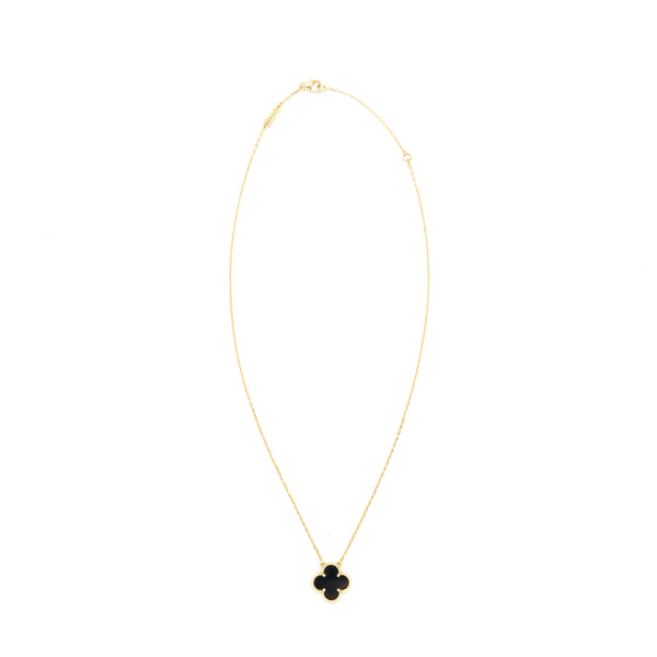 VAN CLEEF & ARPELS VINTAGE ALHAMBRA PENDANT ONYX AND YELLOW GOLD