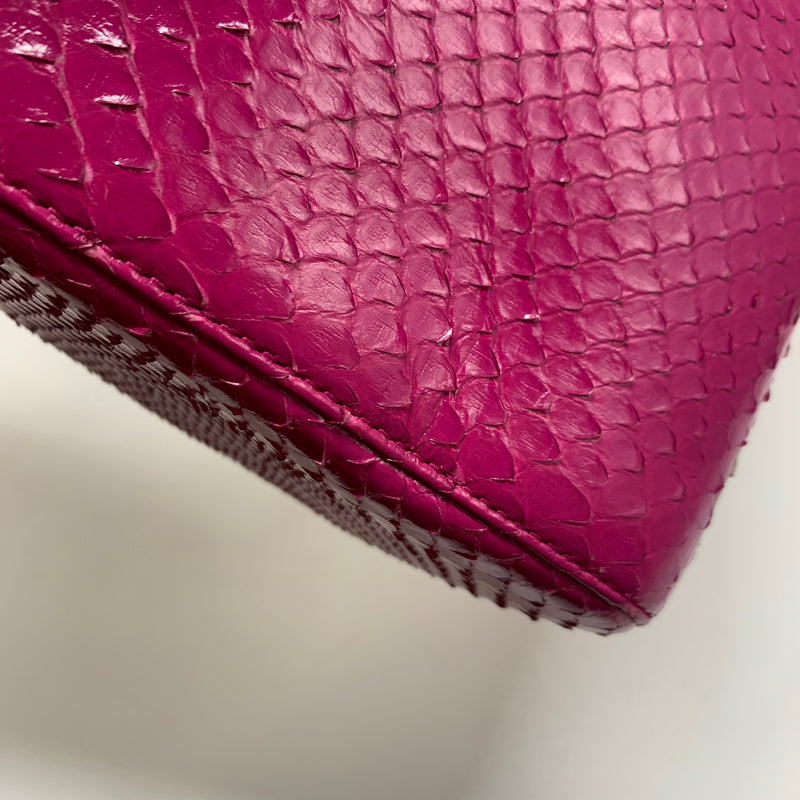 Louis Vuitton pouch in plum python